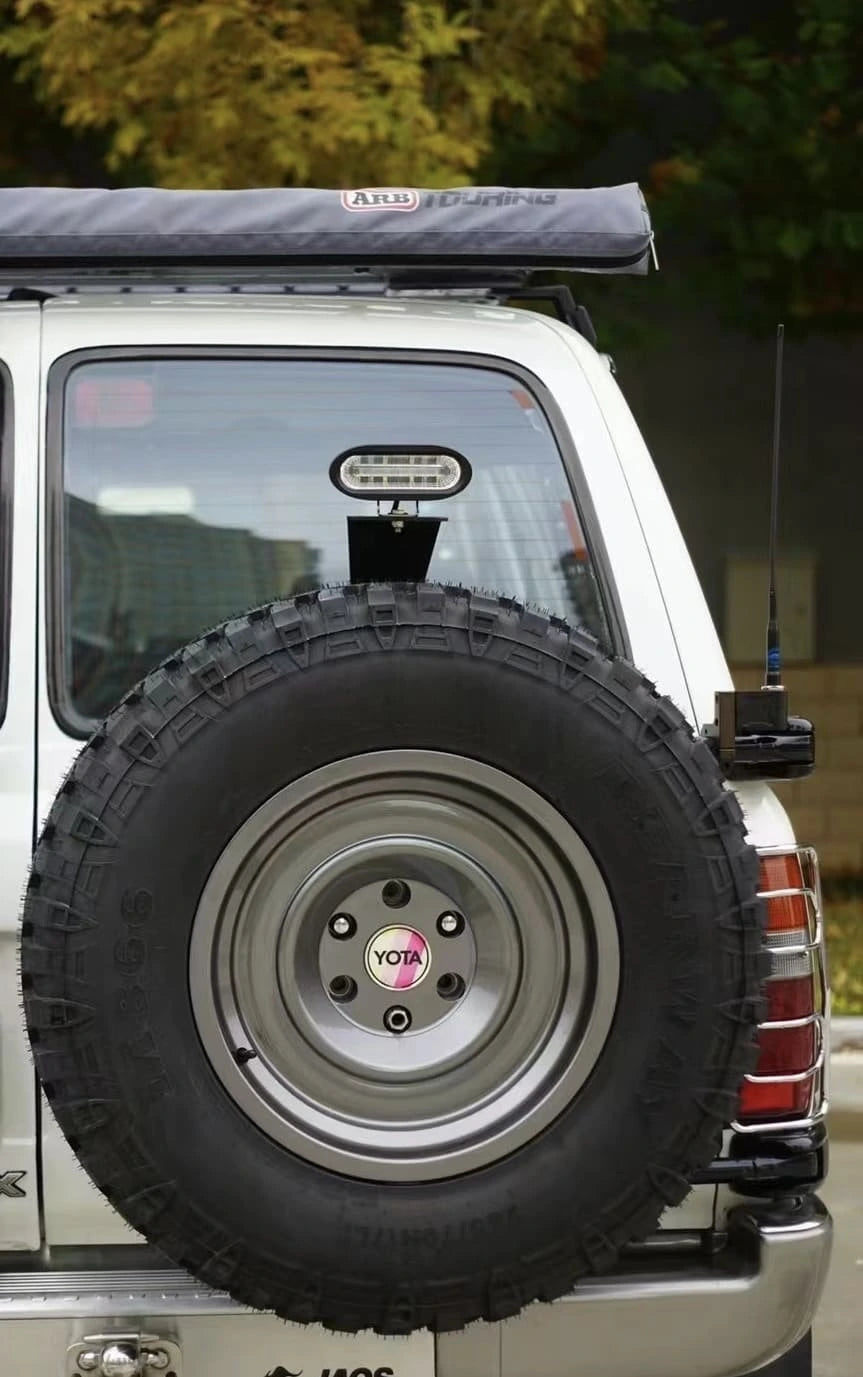 Toyota Land Cruiser 80 Series rear tire carrier 3rd brake light bracket metal mounted on spare wheel carrier with led spot reverse light