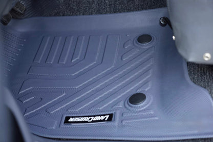Car floor mat with a brand logo on a vehicle interior background Land Cruiser lc80