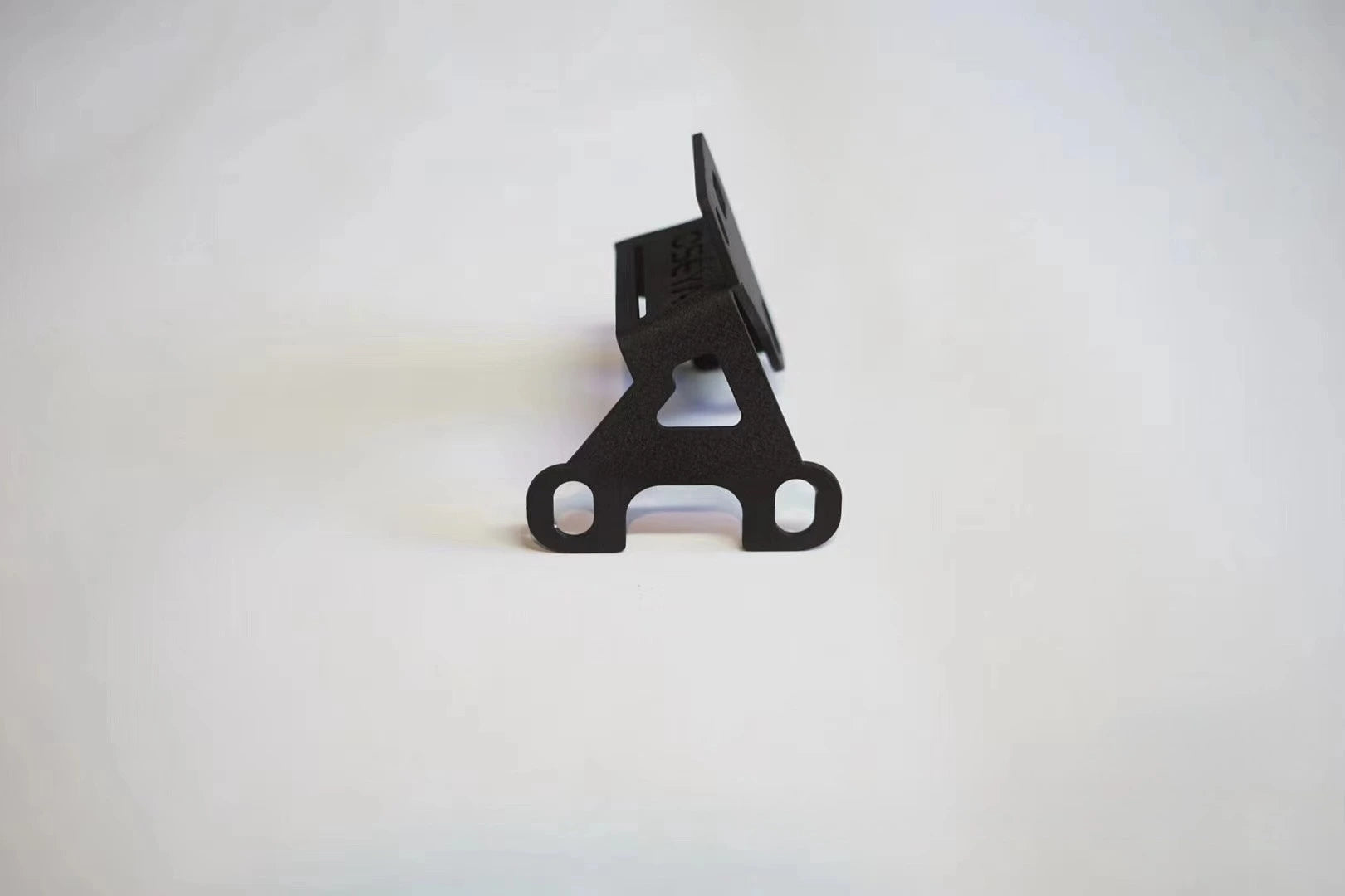 Side View of a Heavy-duty hinge mounting bracket for Toyota Land Cruiser 100 rear LED work lights and accessories 