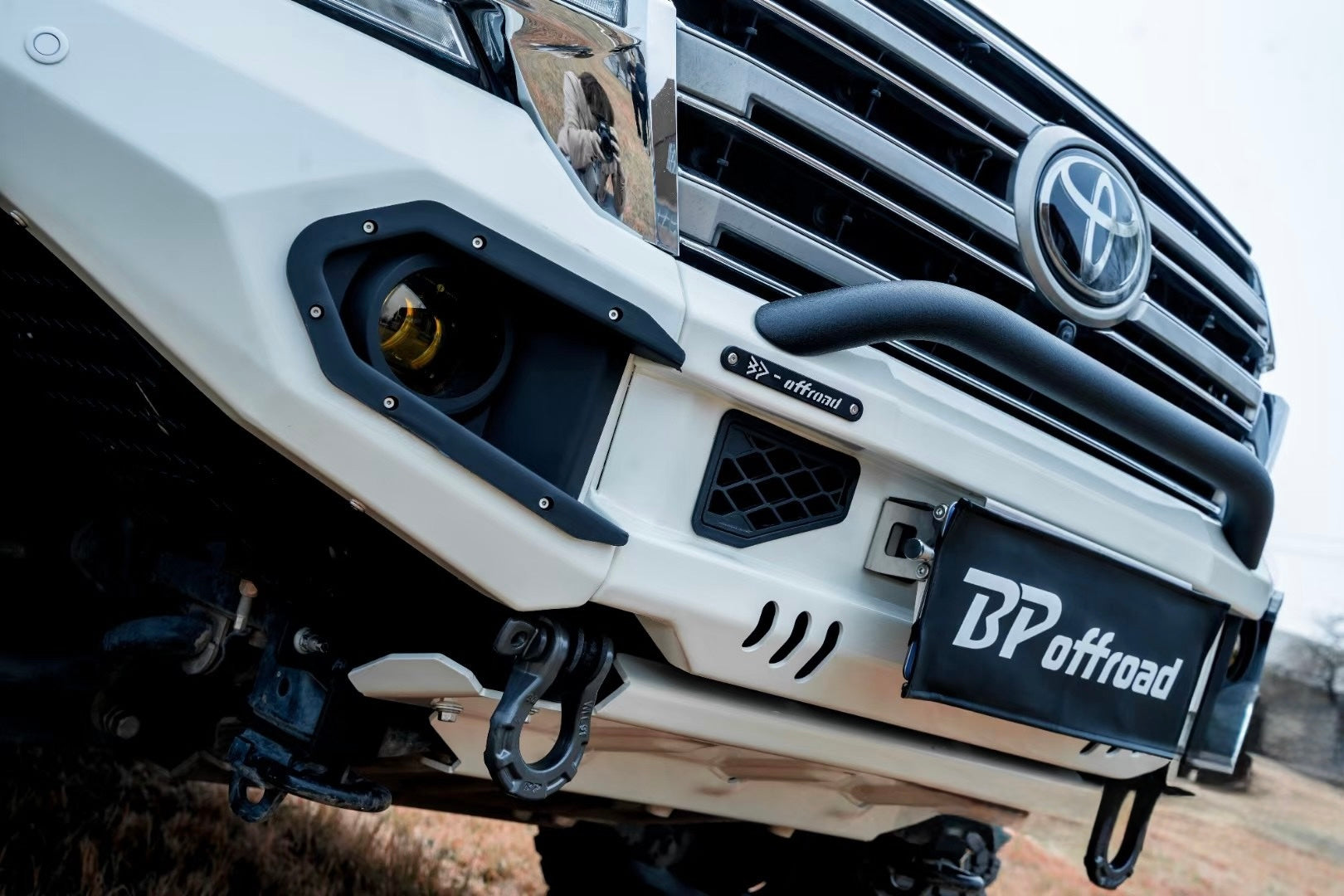 Close-up of a Toyota vehicle with BP Offroad branding on the white bumper