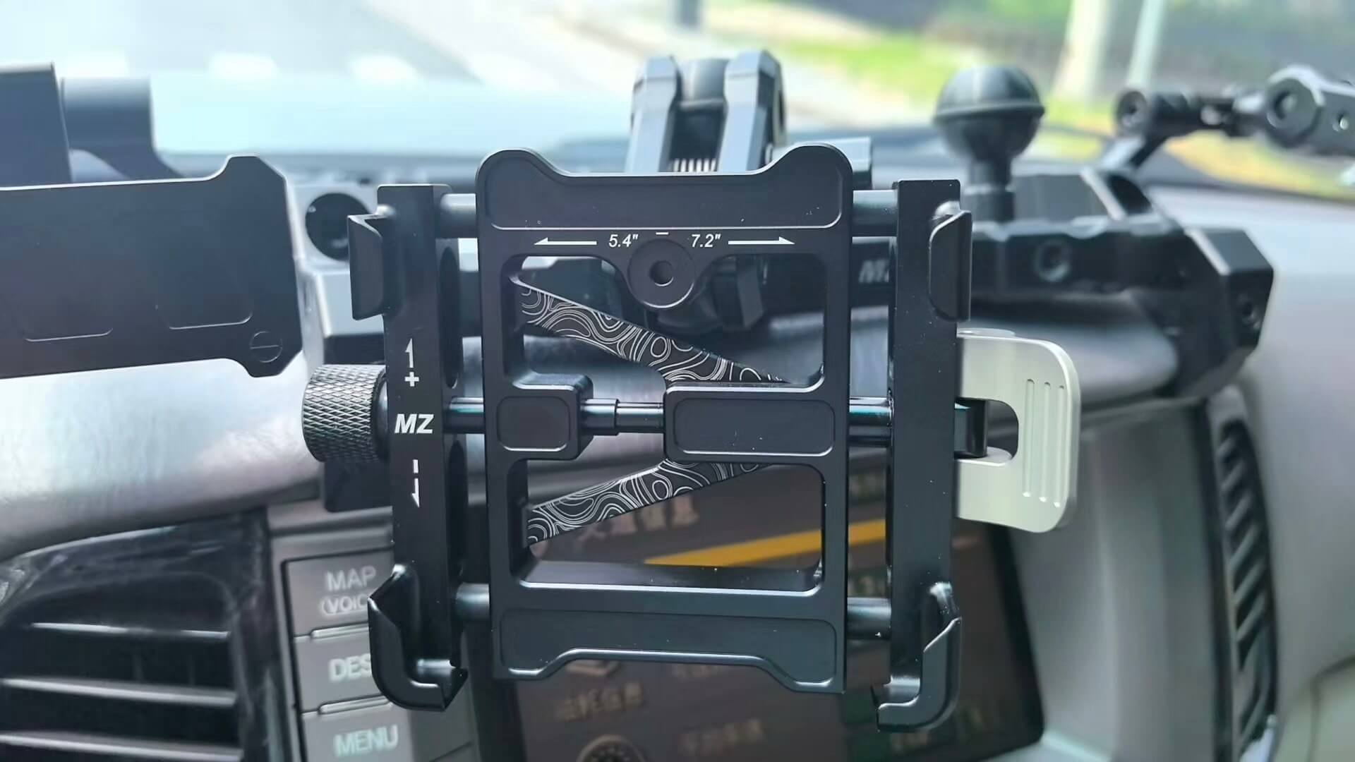 close-up photo of tablet or phone mount installed with all metal components
