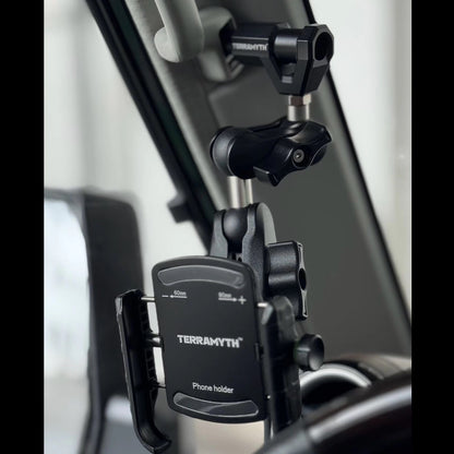 Phone holder with Terramyth branding attached to a Land Cruiser 70 series A-pillar grab handle