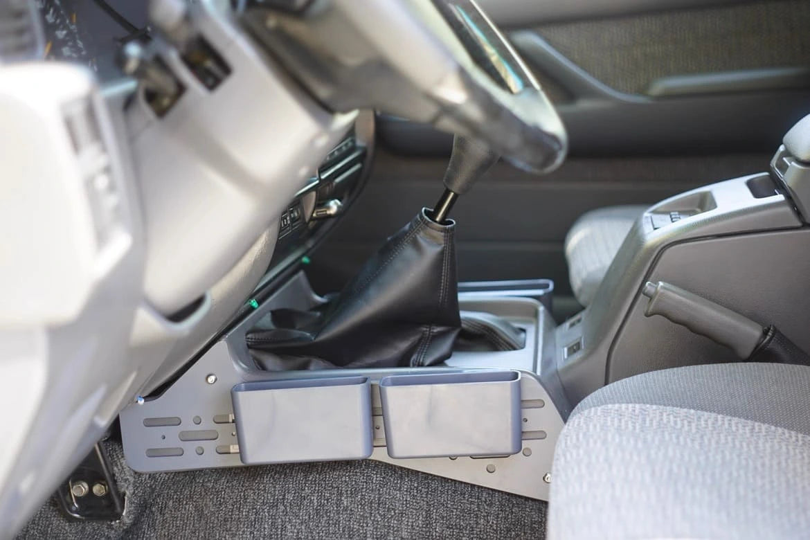 Installed side console organizer with dual storage pockets in Toyota Land Cruiser 80 Series