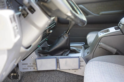 Installed side console organizer with dual storage pockets in Toyota Land Cruiser 80 Series