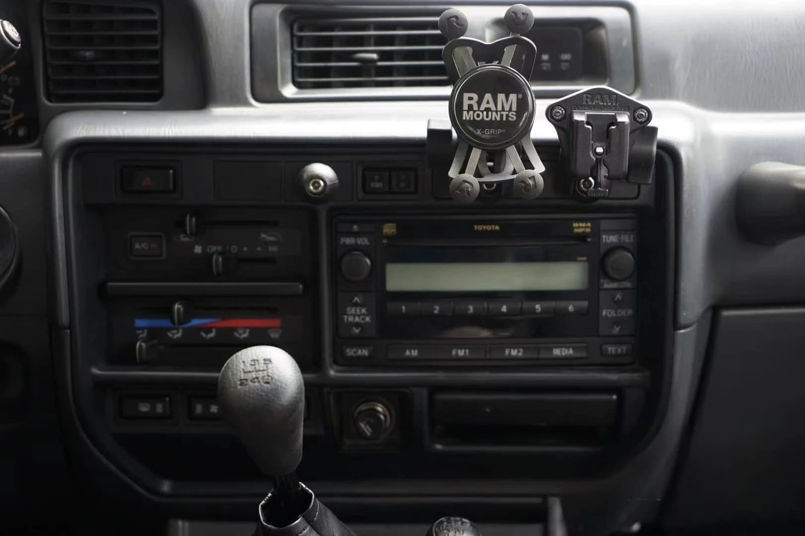 universal gadgets phone mount installed with RAM phone mounts and handy on Land Cruiser 80 series factory dash