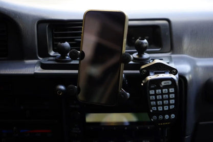 universal gadgets phone mount installed with iphone and CB radio handset on Land Cruiser 80 series interior dash zoom