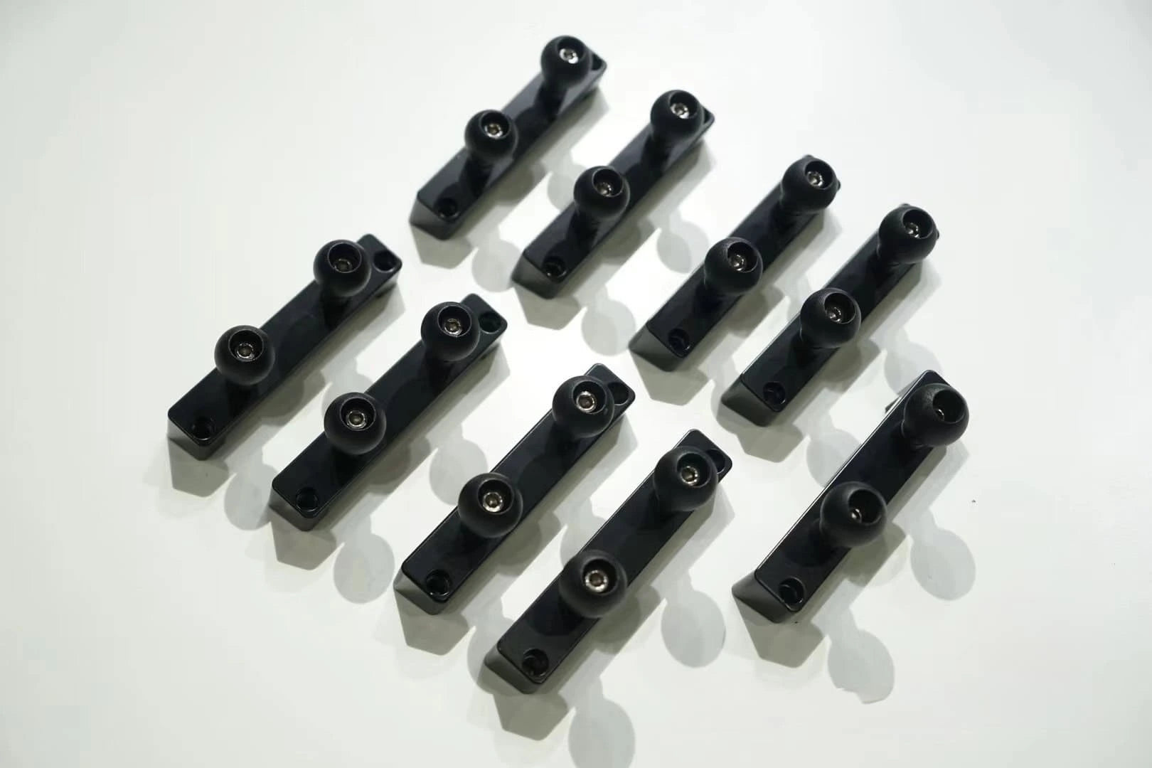 multiple pieces of balck dual universal gadget mounts for land cruiser 80 series and lx450