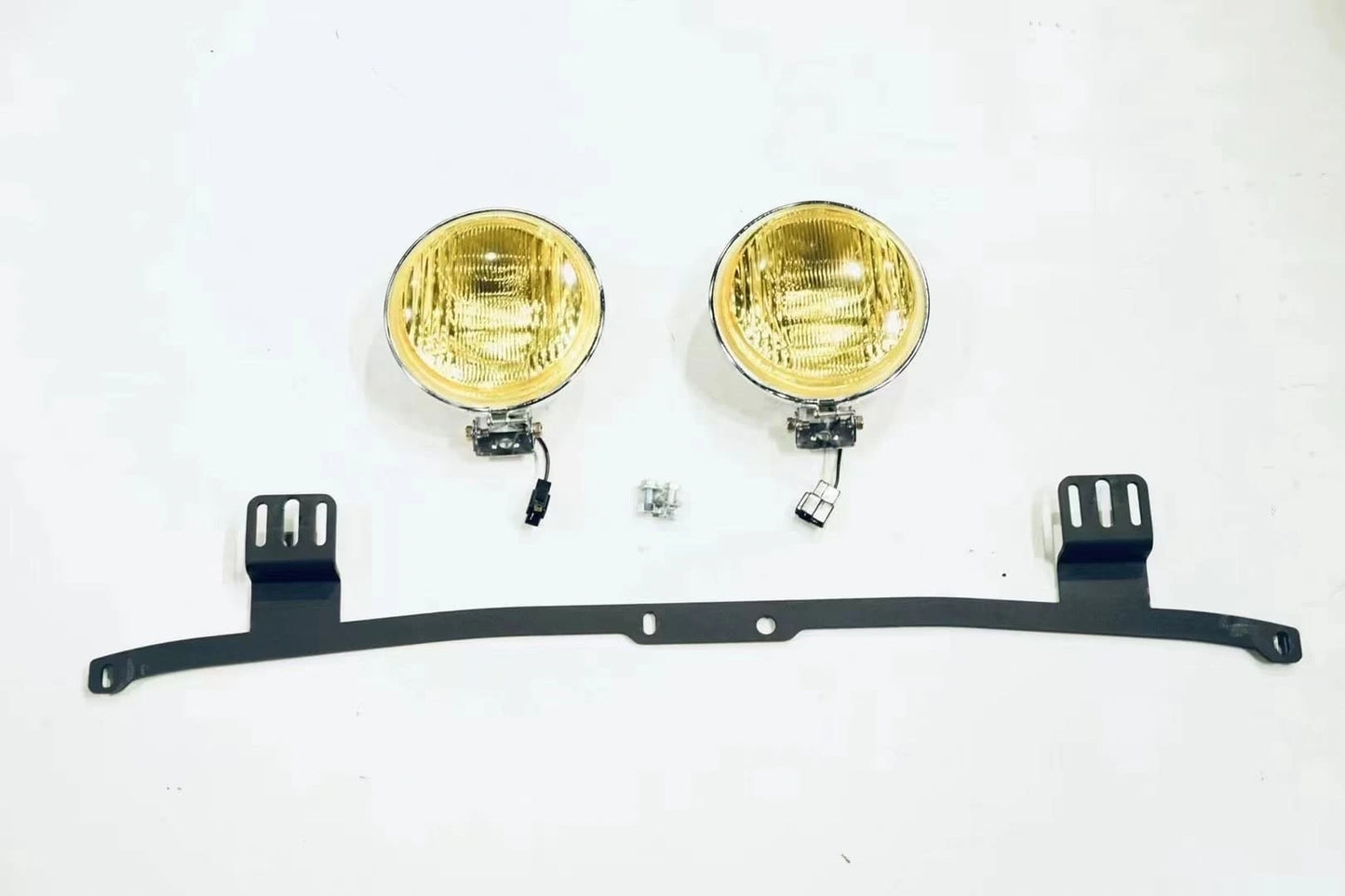 LC100 yellow fog light kit with bracket and hardware bolts and nuts