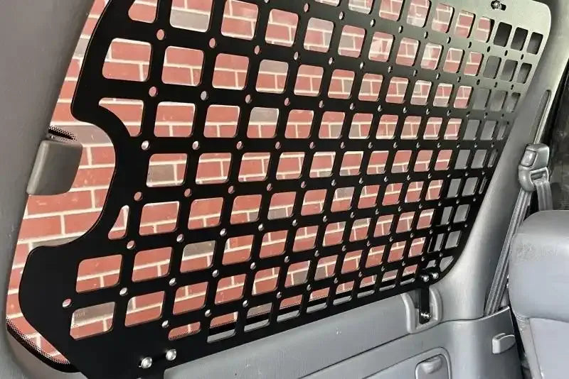 MOLLE cargo panel rack installed on rear sidewall rear quarter panel 3rd window of Land Cruiser 100 or LX470 for modular gear mounting