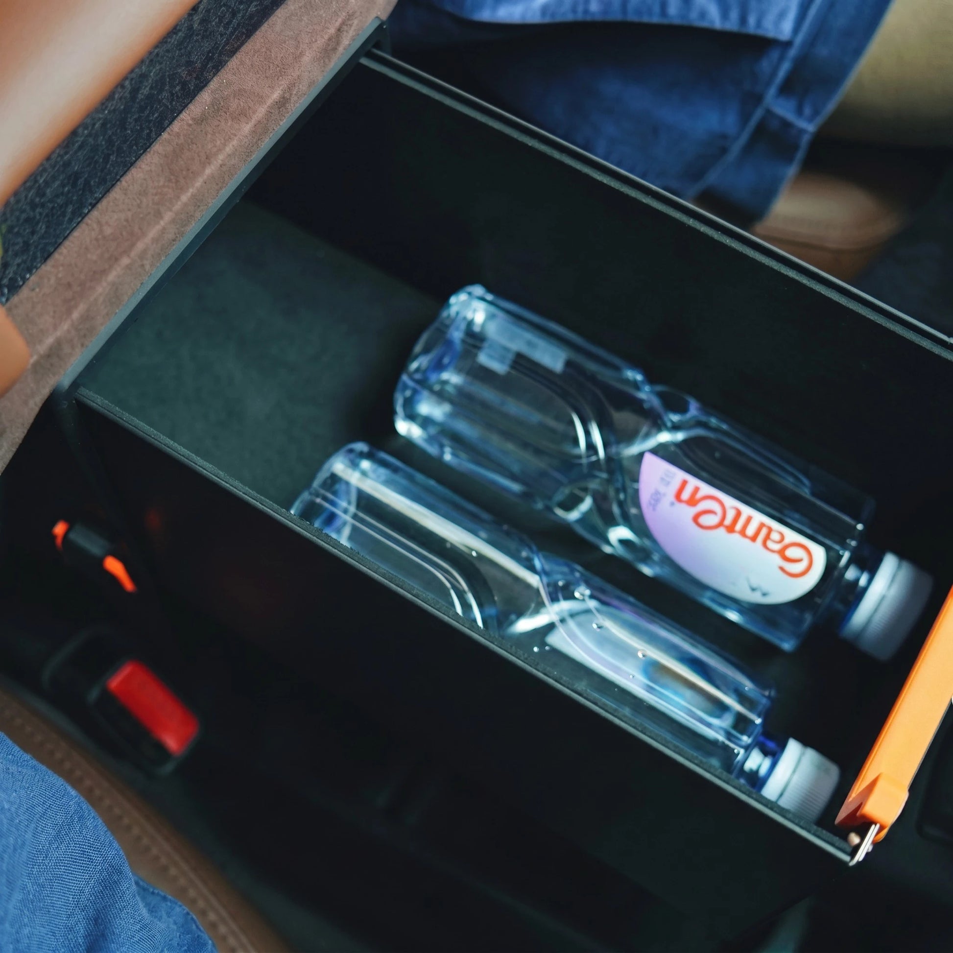LC70 center console drawer storage open with two water bottles stored inside