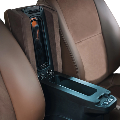 View of Ninja Cruiser armrest fitting over the factory cool box/fridge console. Essential storage upgrade for LC76 Troopy and Machito.