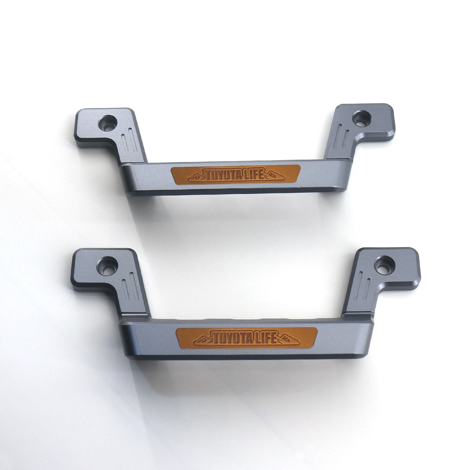 Land Cruiser 70 Series Aluminum Grab Handle Styles - Set of two in gray, front pair with highlighting toyotalife logo in brown and white background