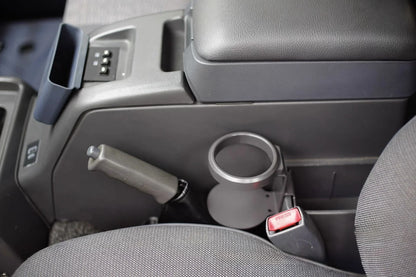 Empty center console cup holder installed in Toyota Land Cruiser 80 Series interior