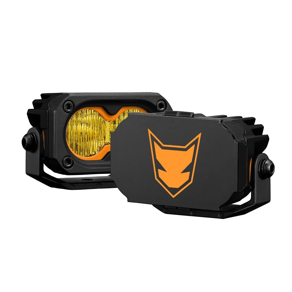 Ninja Cruiser LC100 black steel ditch light brackets with orange accents and logo, for Toyota Land Cruiser 100 Series.