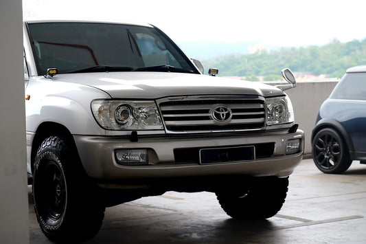 Ninja Cruiser LC100 front ditch light brackets on Toyota Land Cruiser 100 Series, matte black steel