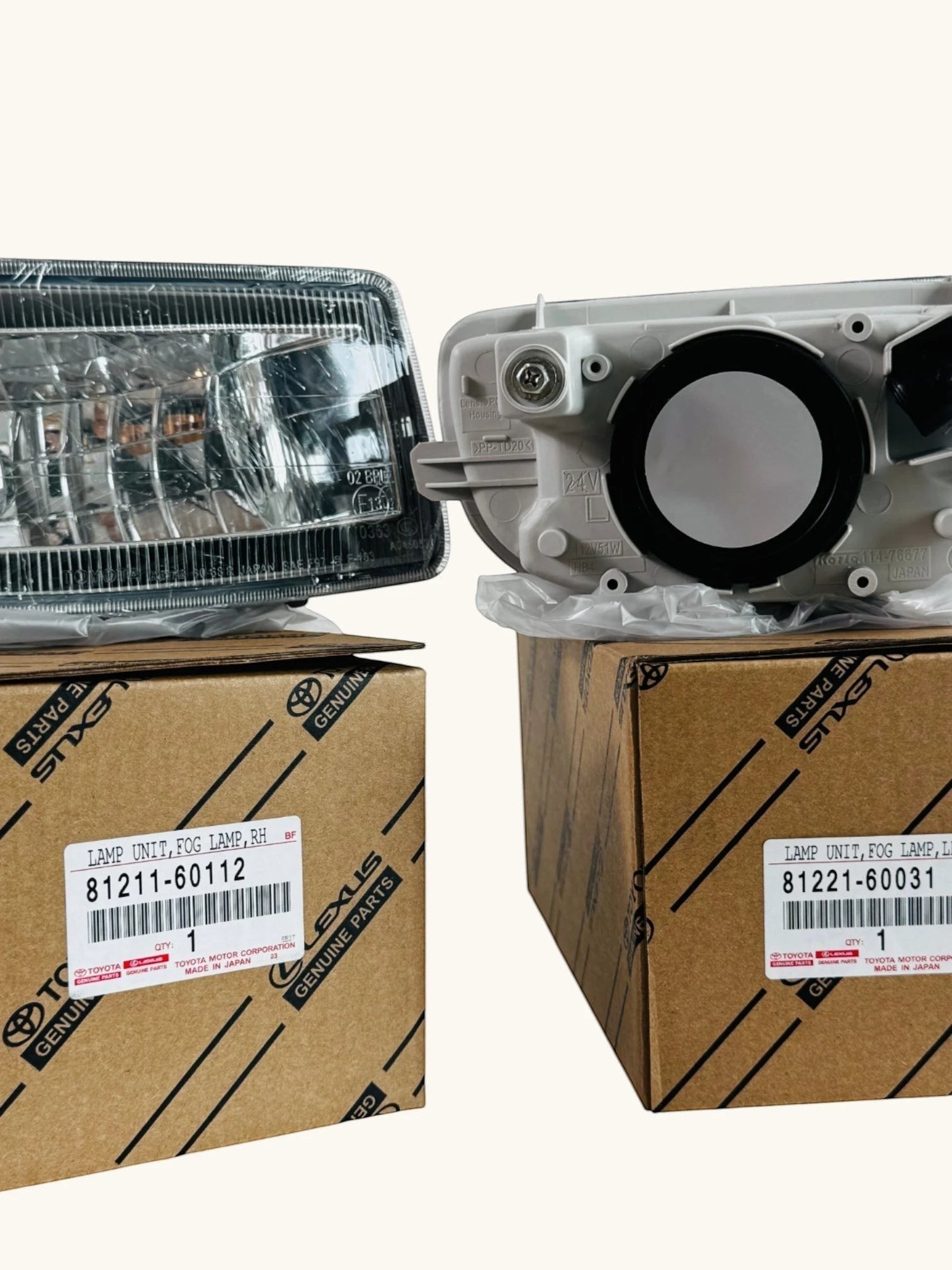 Ninja Cruiser Genuine Toyota LC100 front fog lamps, clear lens, plastic housing, sold as a pair.