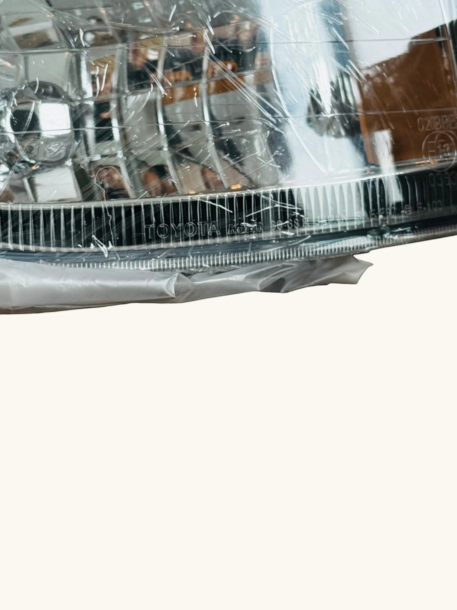 Ninja Cruiser Genuine Toyota LC100 front fog lamp set, clear lens, direct replacement for Land Cruiser 100 Series 1998-2007.