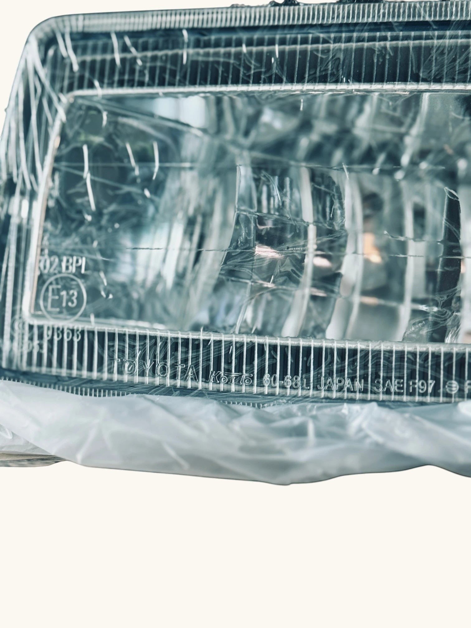 Ninja Cruiser Genuine Toyota LC100 front fog lamp, clear lens, chrome housing, made in Japan.