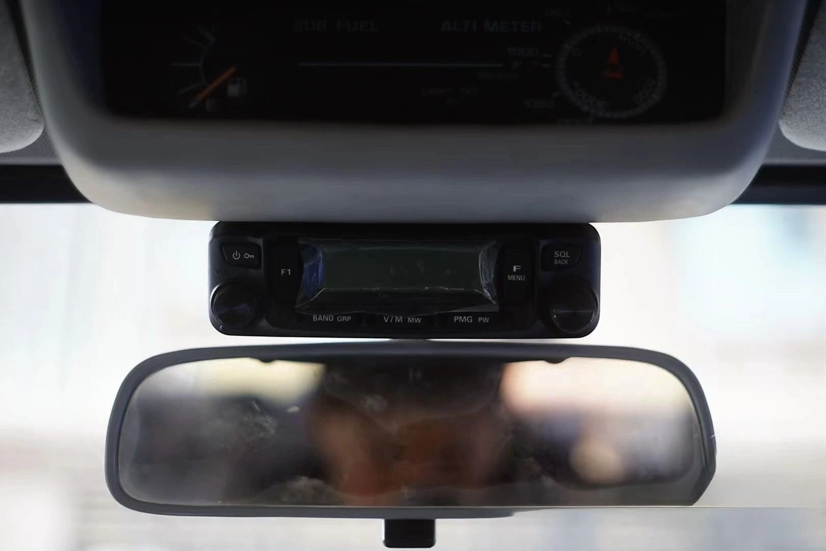 Ninja Cruiser CB radio mount bracket for Toyota Land Cruiser 80/Lexus LX450 (1990-1997). Black steel, no-drill install.
