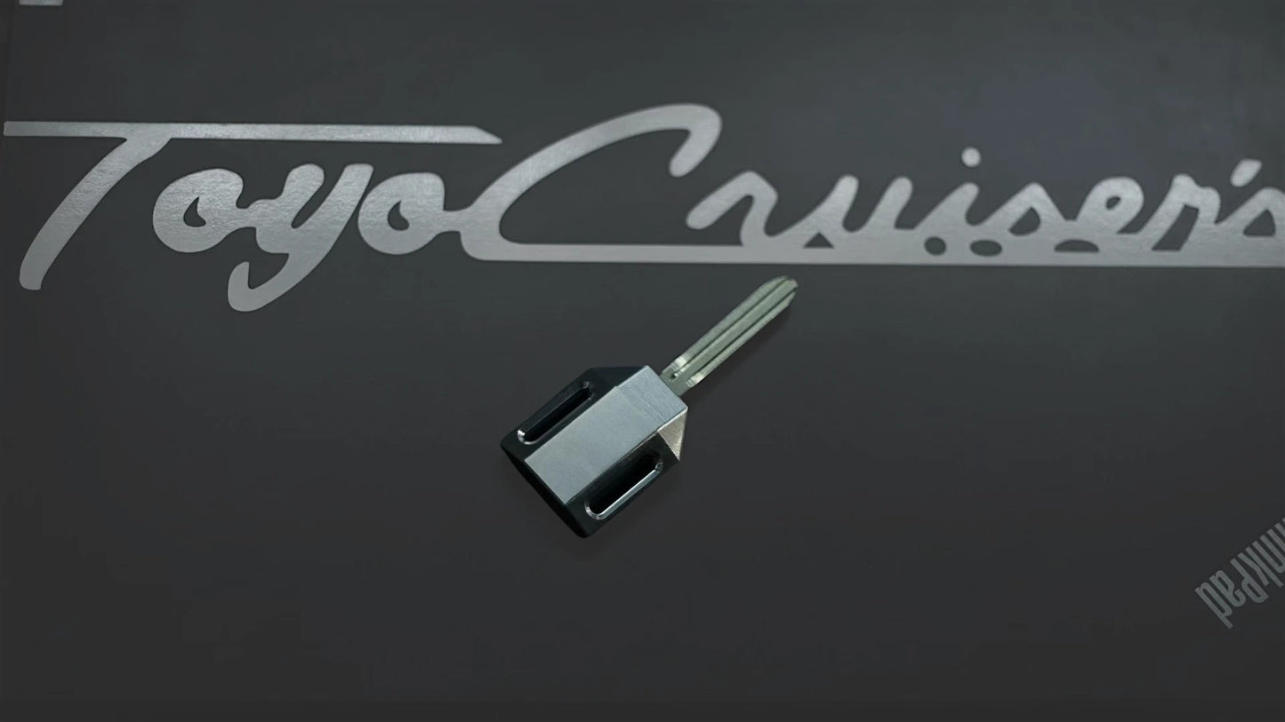 Ninja Cruiser premium metal blank key for Toyota Land Cruiser 70 Series, silver finish.