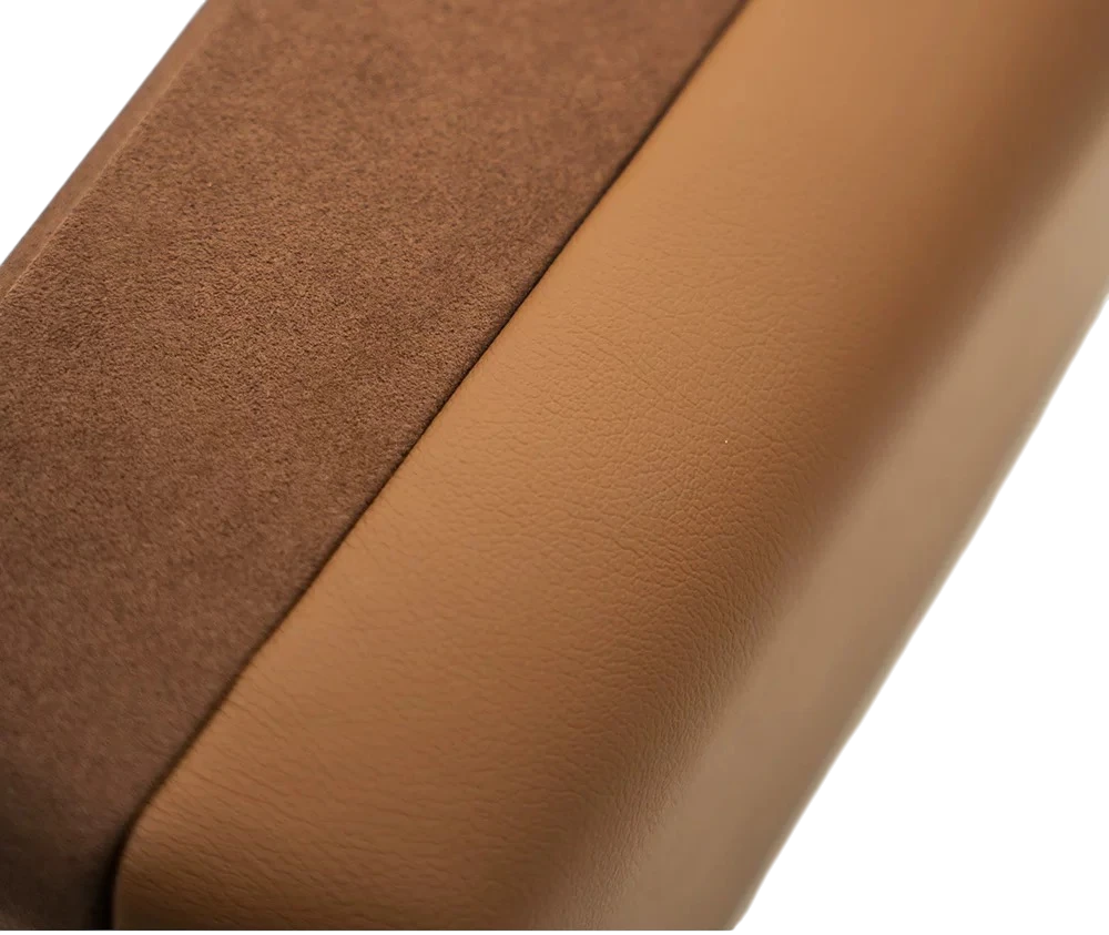Close-up of premium tan leather and velvet texture on Ninja Cruiser hardware. Designed for the camping style Land Cruiser lifestyle