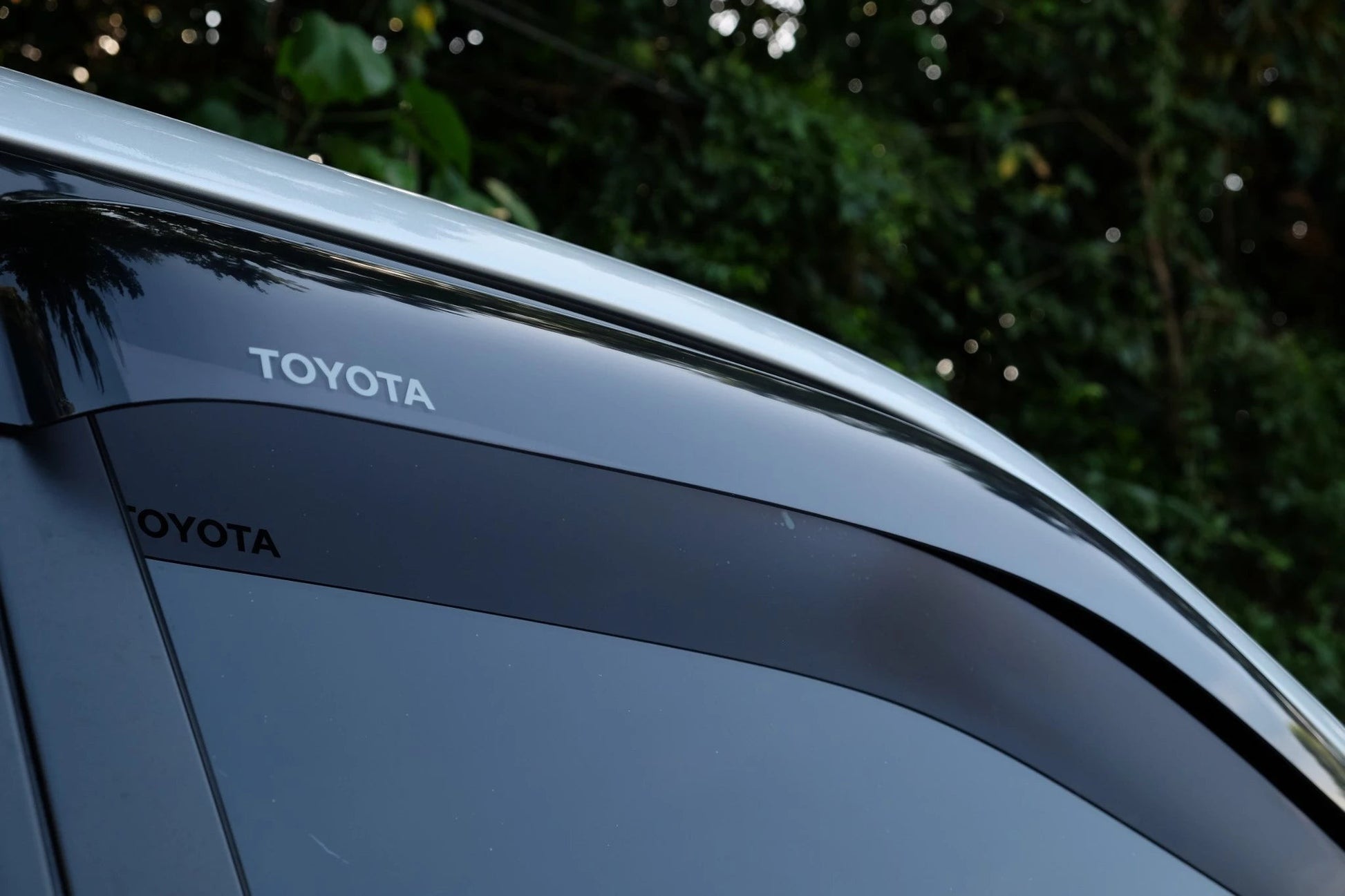 Ninja Cruiser Genuine Toyota JDM window visors for Land Cruiser 100 Series & LX470. Dark tinted acrylic.