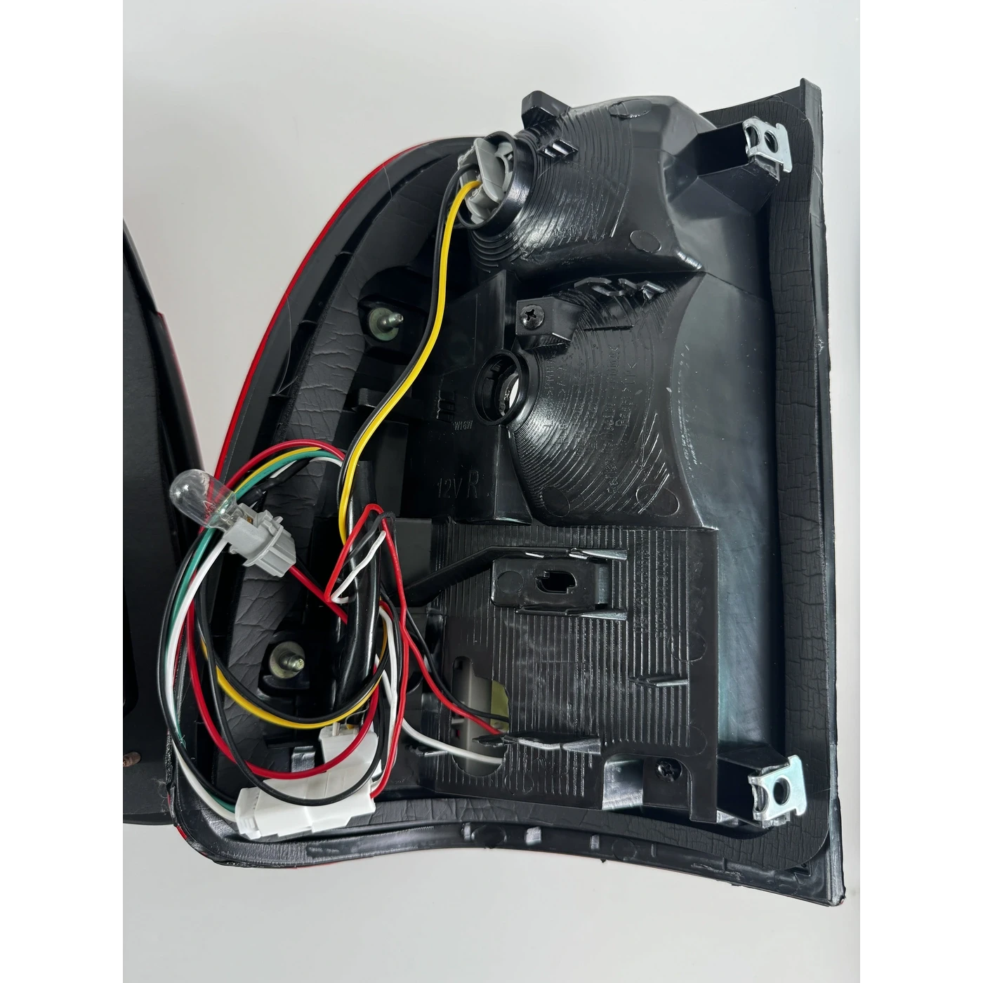 Ninja Cruiser LED tail light for Toyota Land Cruiser 100 Series (2003-2007). Features plug-and-play installation and IP67 waterproof rating.