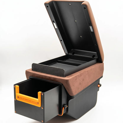 LC70 center console armrest lid open and drawer pulled out showing dual storage compartments