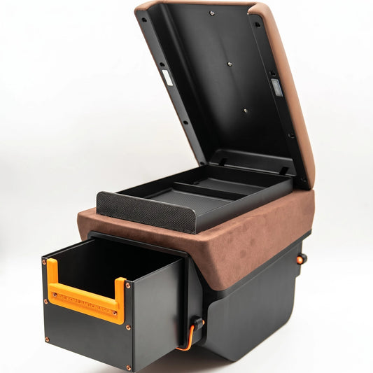 LC70 center console armrest lid open and drawer pulled out showing dual storage compartments