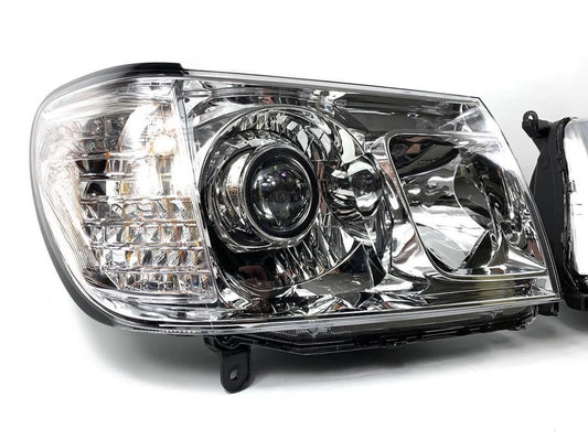 Car LC100 Land Cruiser front left headlight projector LED on a white background