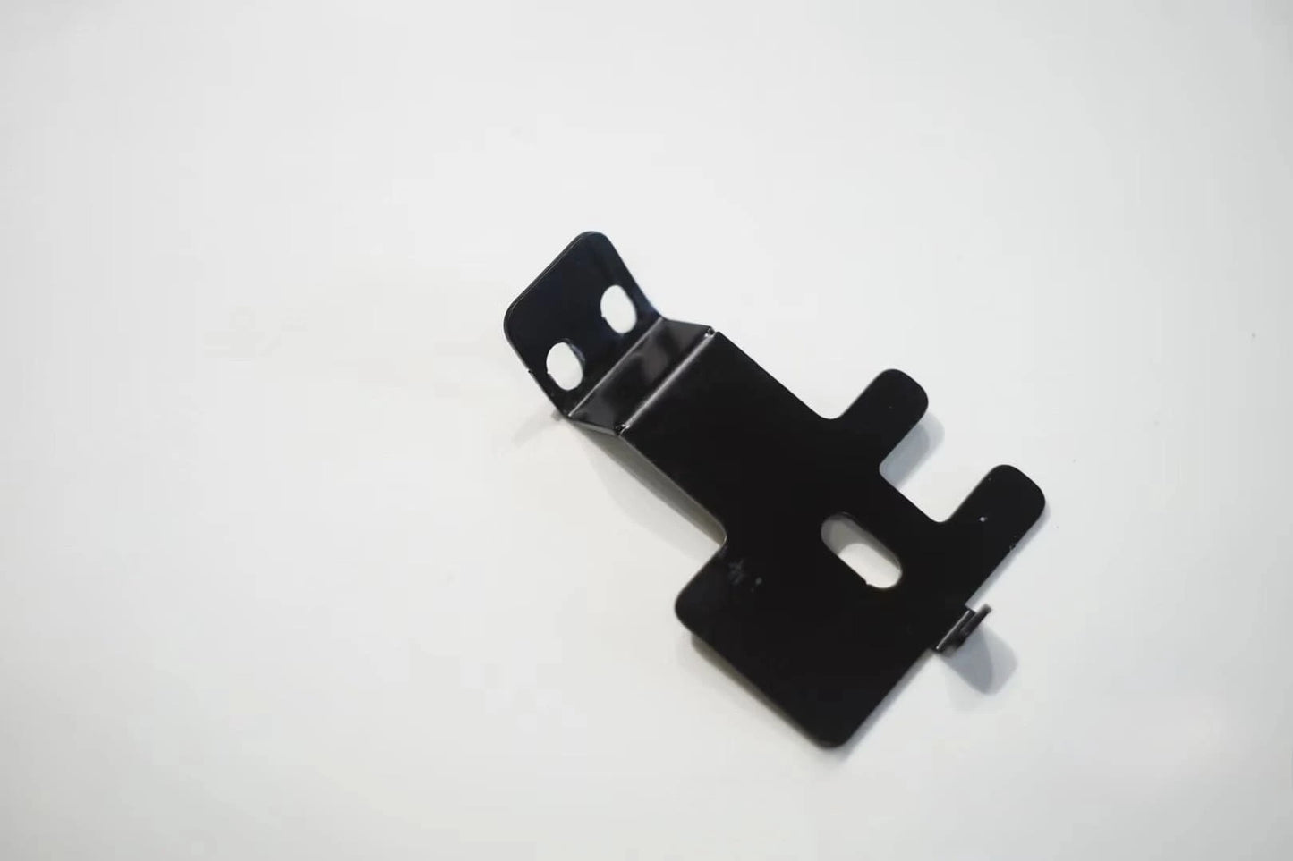 Close-up of custom cb radio bracket for Land Cruiser 80 and LX450