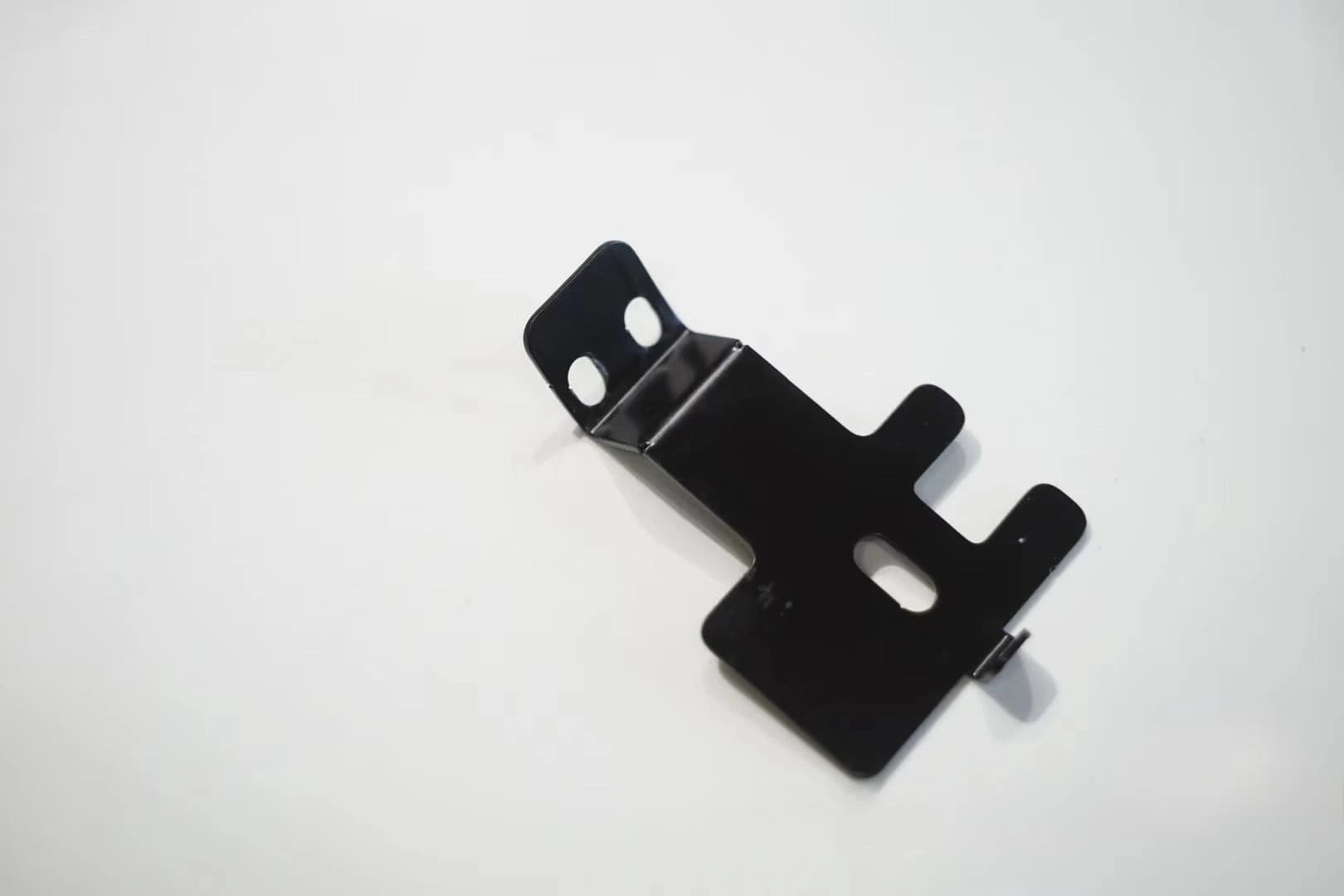 Close-up of custom cb radio bracket for Land Cruiser 80 and LX450