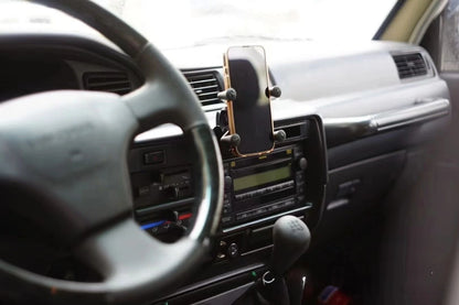 Toyota Land Cruiser 80 Series Lexus LX450 single dash mount for phone or CB radio – interior accessory holder front view