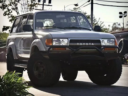 Toyota Land Cruiser 80 Series or Lexus LX450 fitted with Slee-Shortbus style heavy duty custom front winch bumper for off-road protection