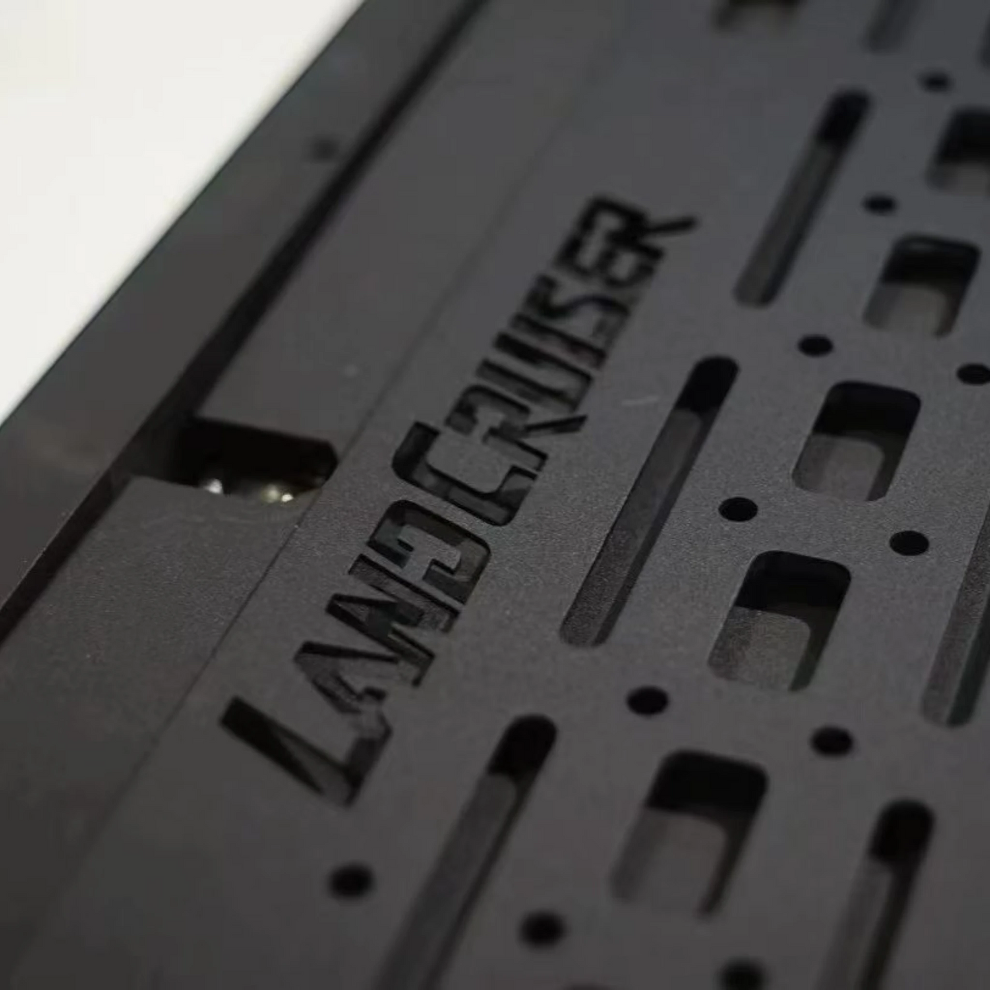 Toyota Land Cruiser LC76 rear tailgate MOLLE panel fold-down table close-up