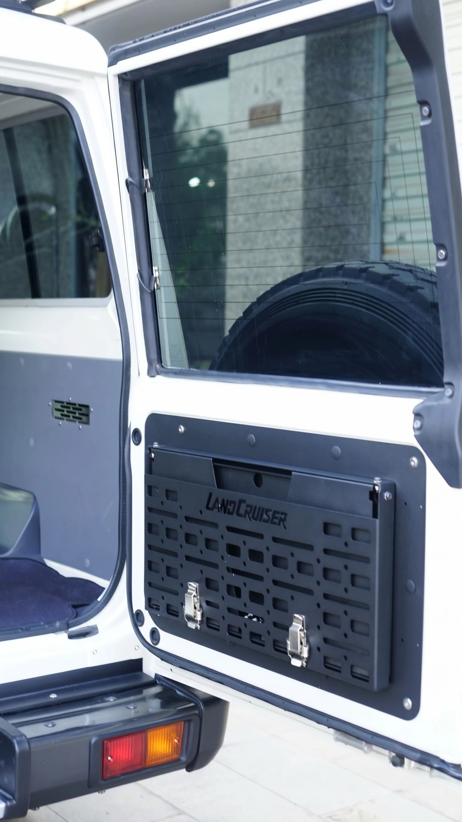 Rear tailgate MOLLE storage panel installed on Toyota Land Cruiser LC76