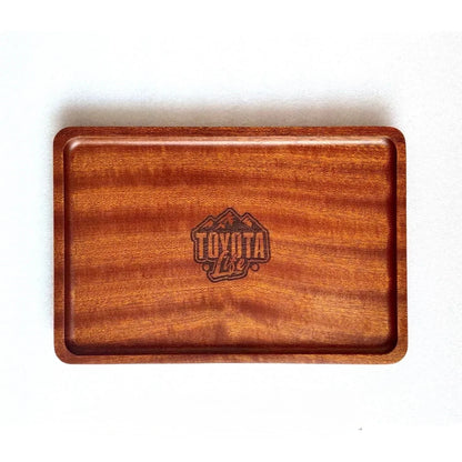 Wooden tray with Toyota Life logo on a white background